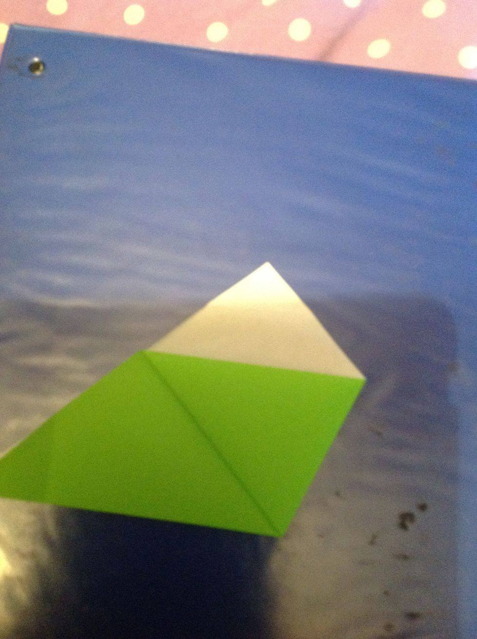 Do the same fold but tuck that piece between instead of on top