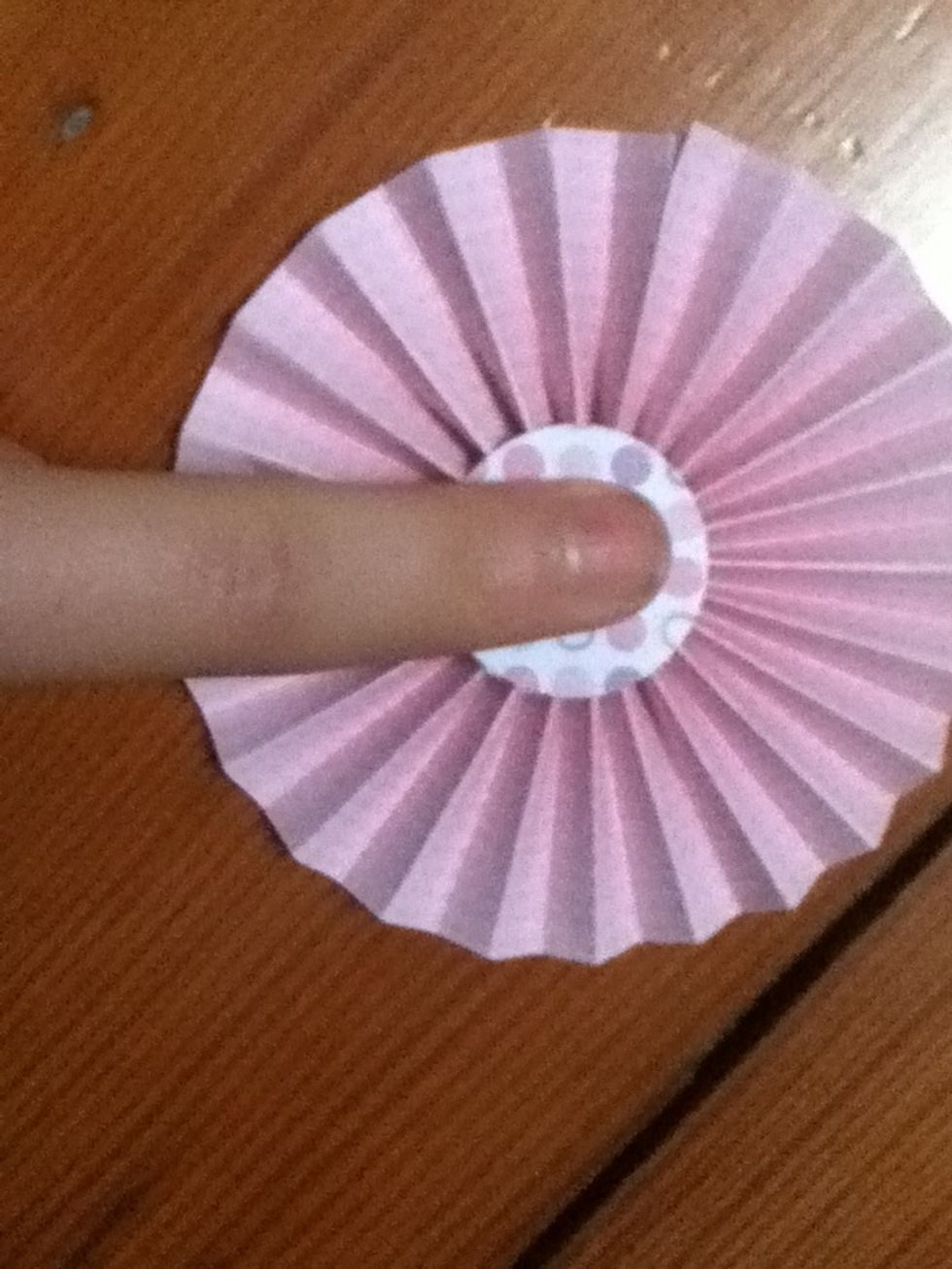 Do the same for the other circle of paper, and put it on the other side. Voila! You are done!