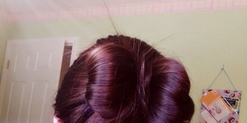 Do the same for the other side, pin down the middle and enjoy your bow hairstyle