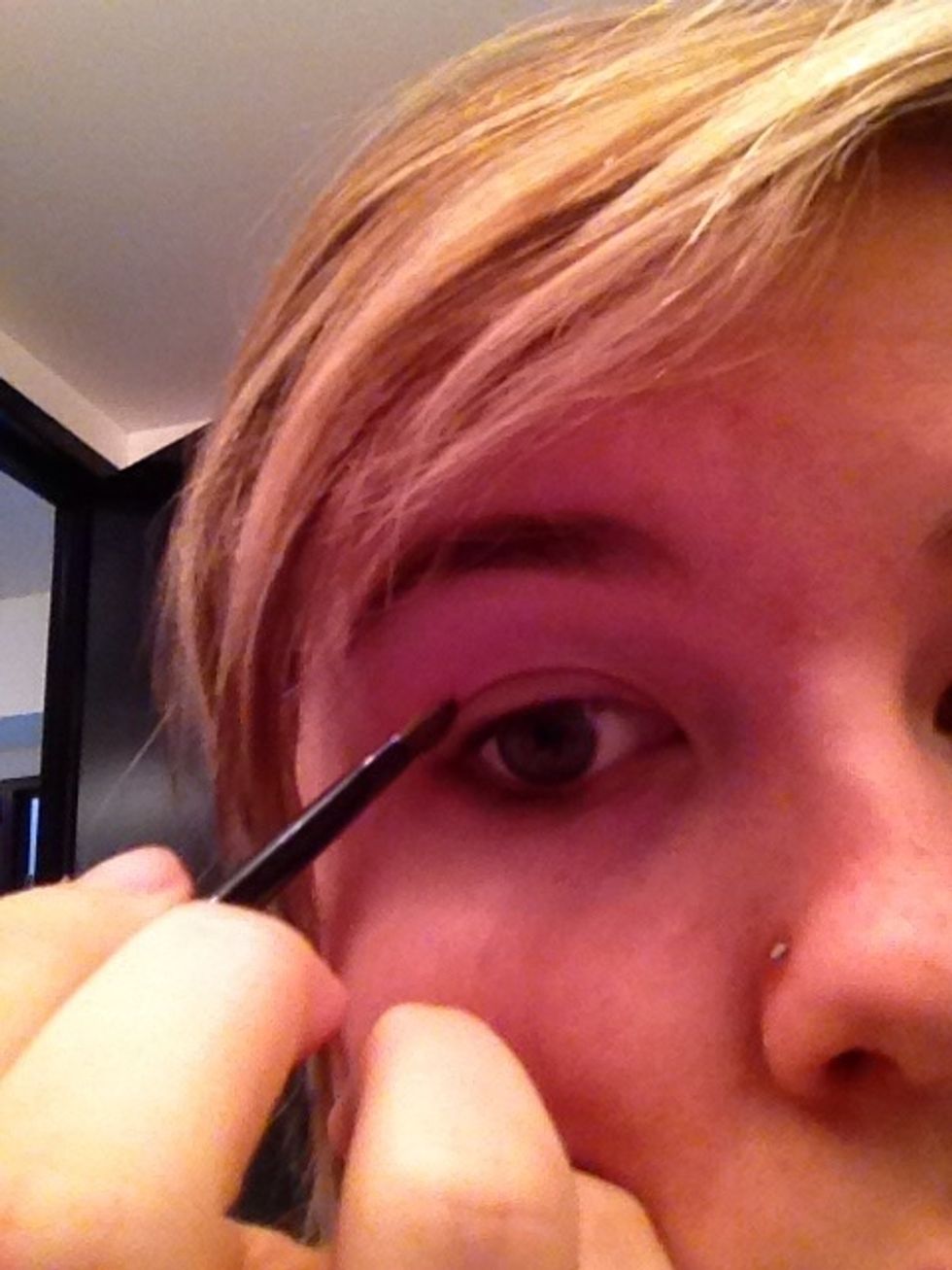 Do the same for the top, but only 1/3 of the way across. Drag the brush towards the center but try to keep it closest to your waterline