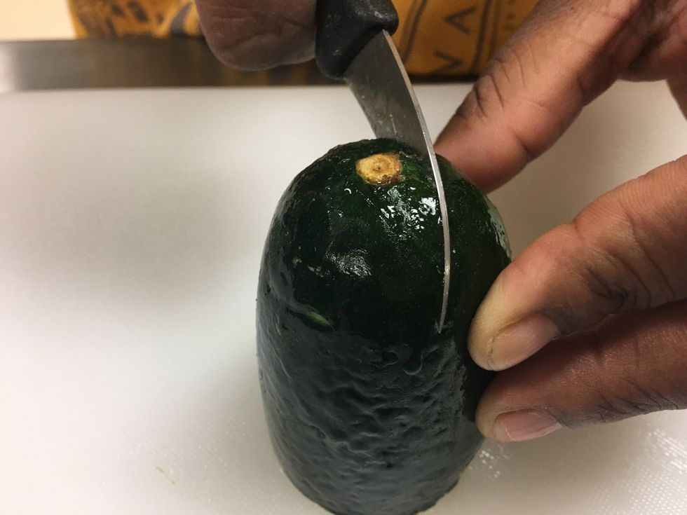 Do the same on the other side, making sure each cut connect at the top and bottom.