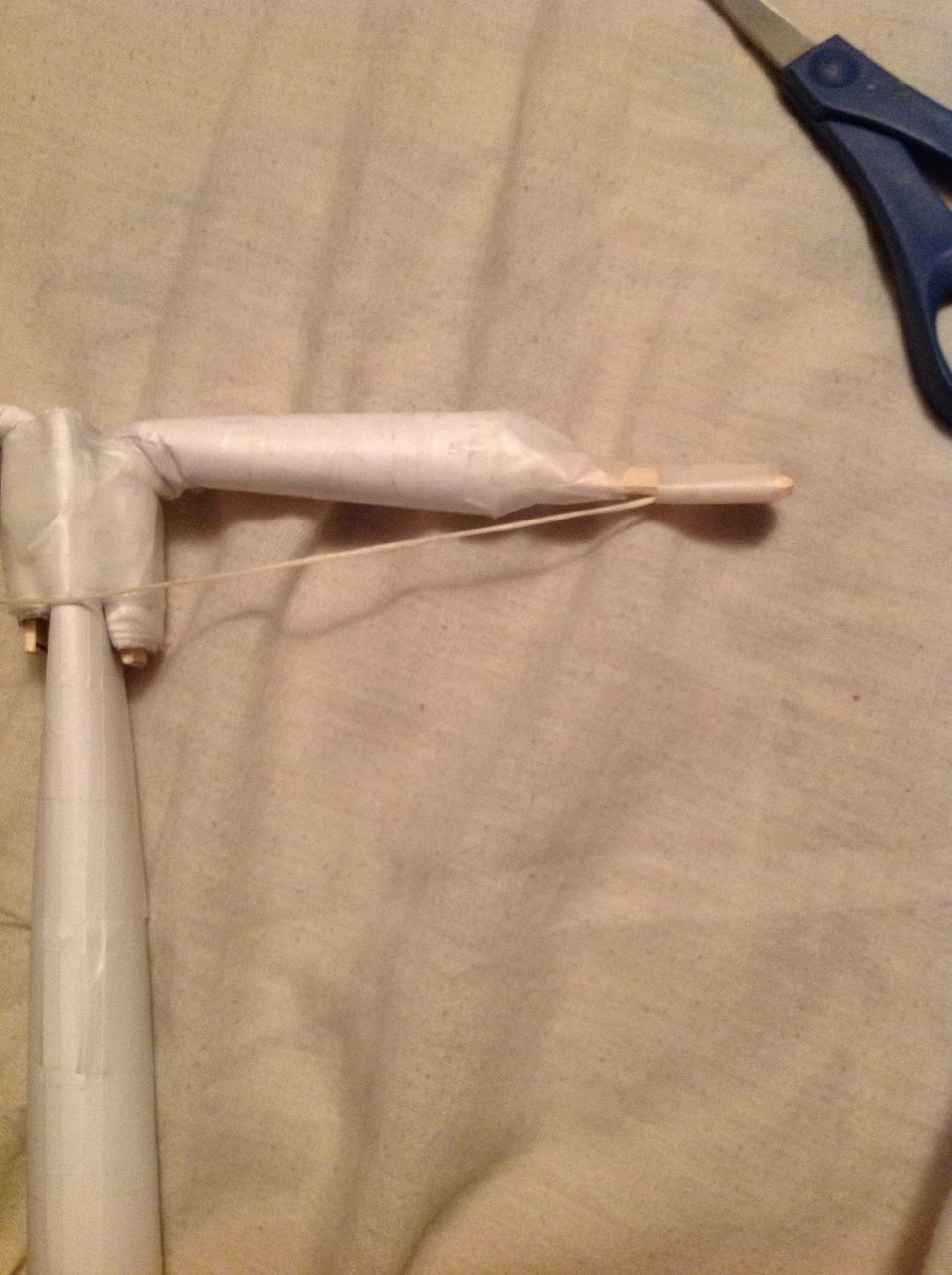 Do the same process and tape it down because you don't want it moving all around, it would just mess up your entire bow.
