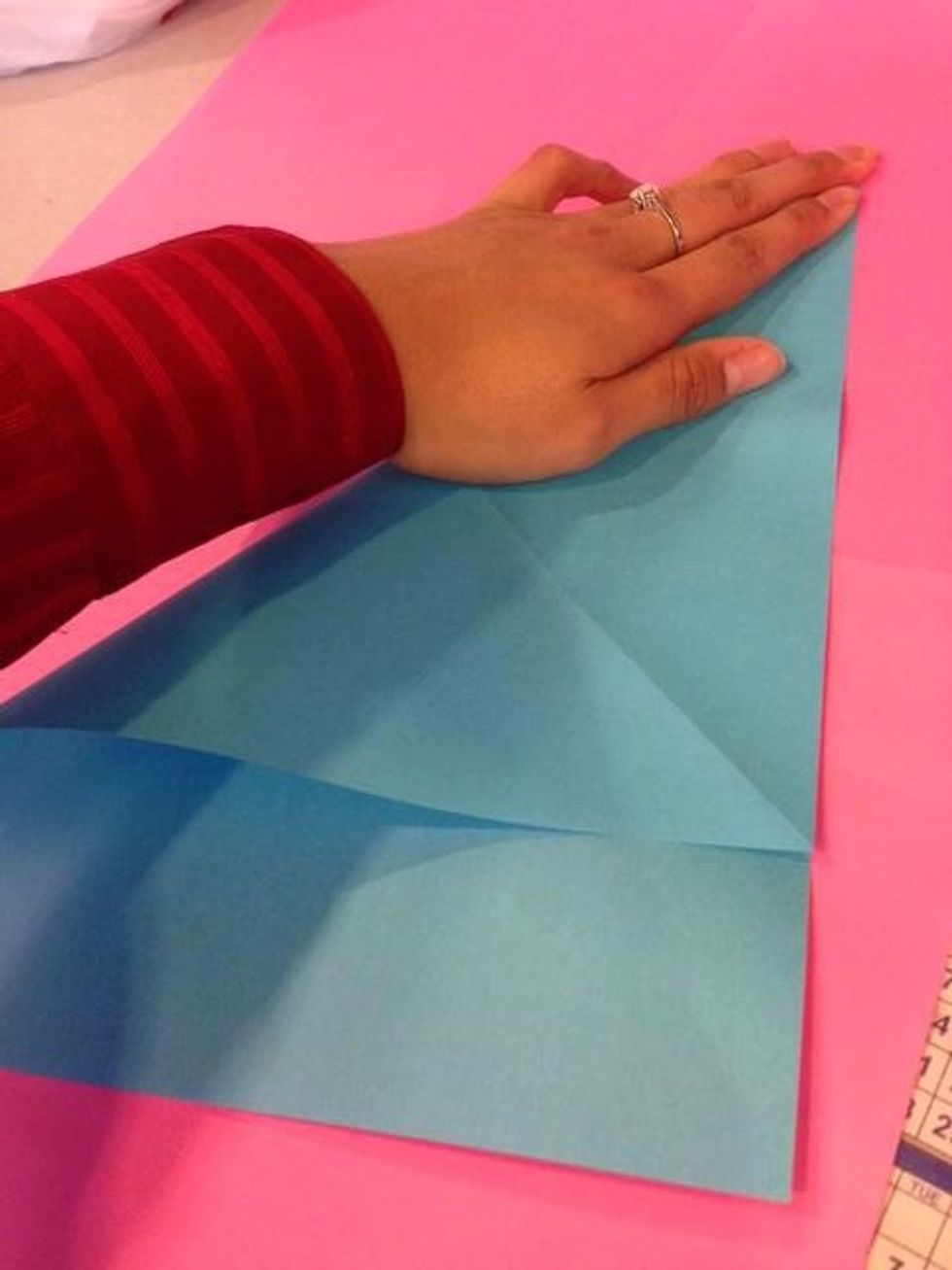 Do the same thing for the left side what were doing is creating creases so that our future folds will be easier :)