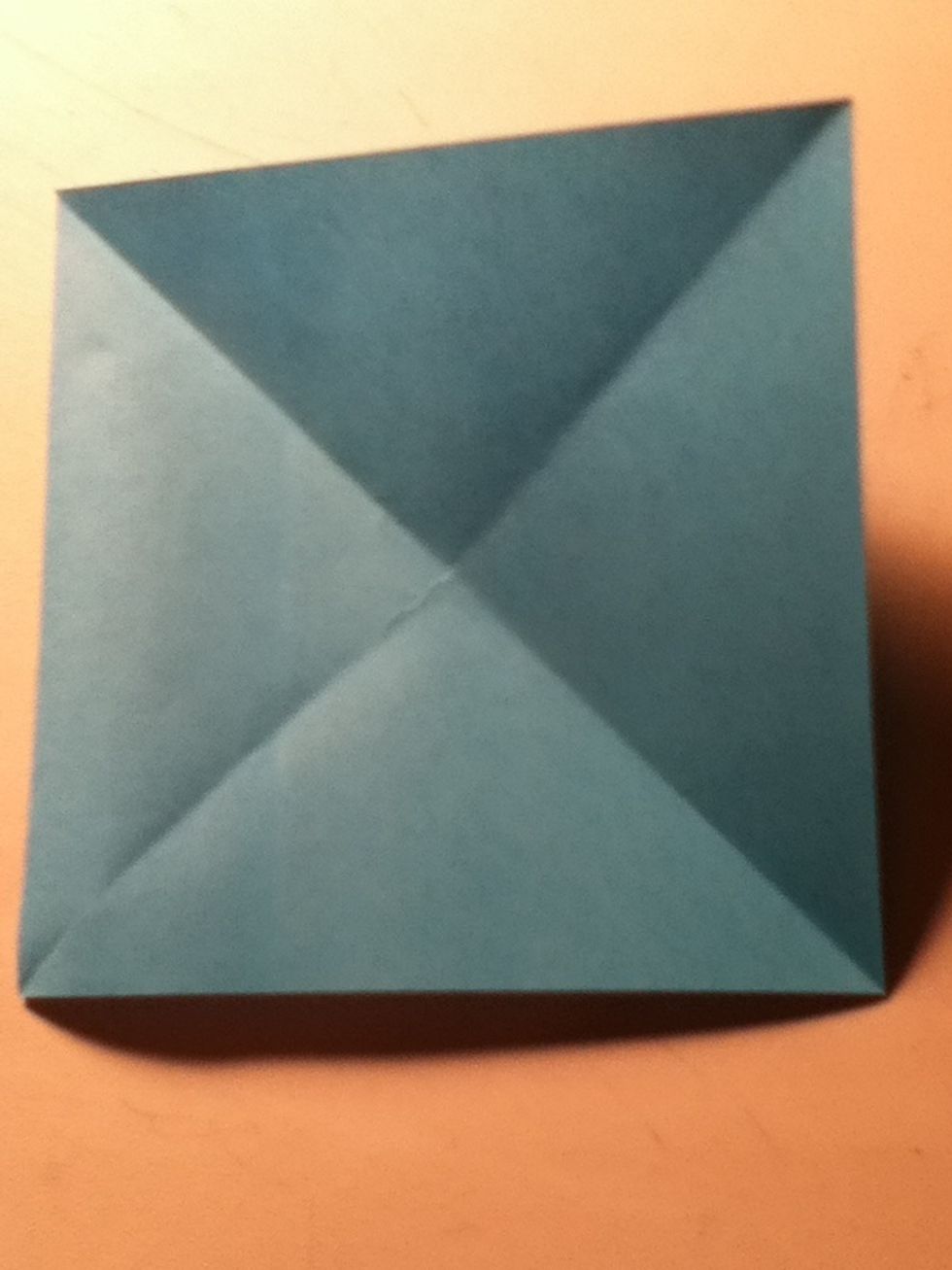 Do the same to the other side so it makes an "x"