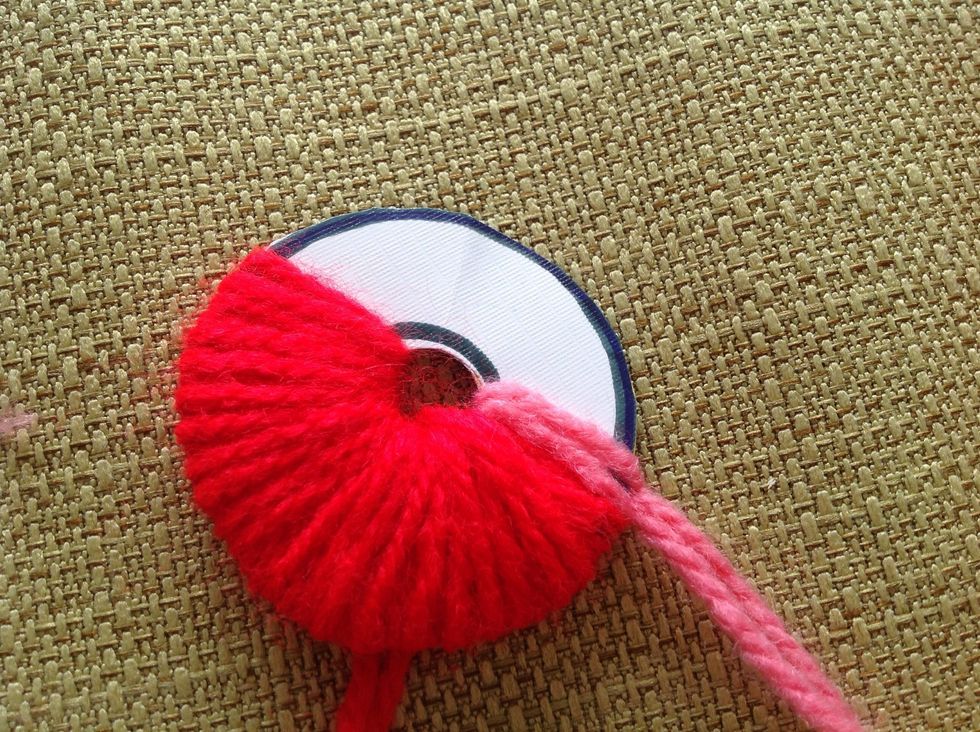 Do the same to the other side with a different color string after you finish this side.