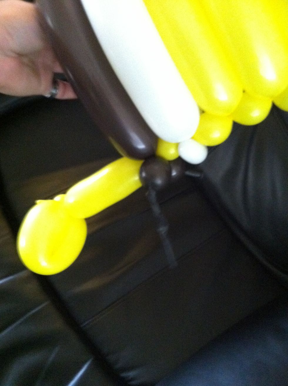 Do the same to the remainder of the brown balloon.