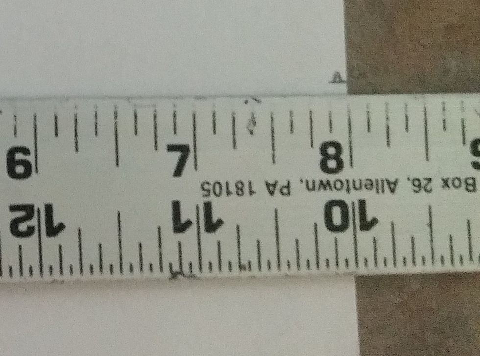 Do the same to the right side of the paper. Two inches from the bottom of the paper.