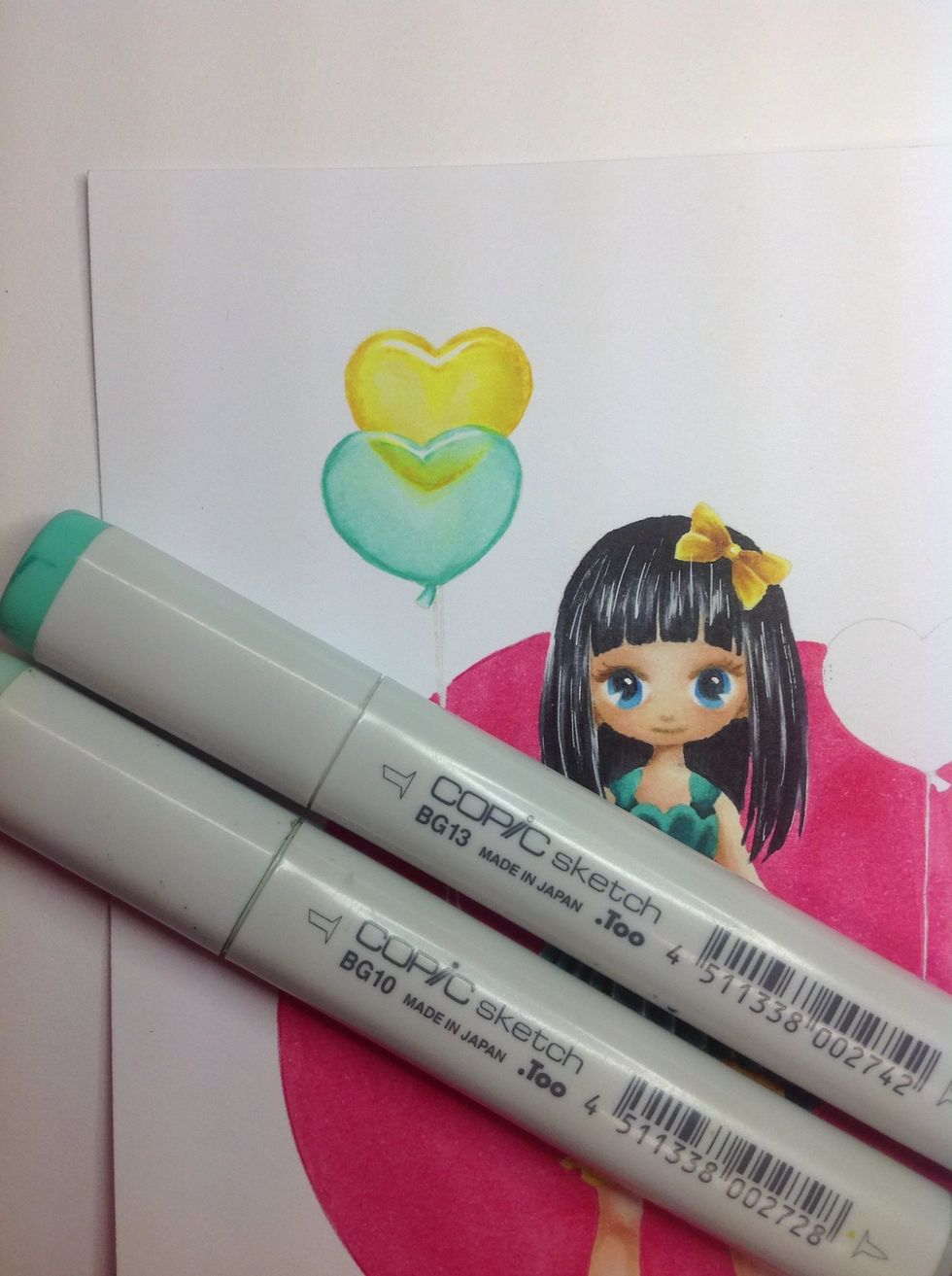 Do the same with the balloon in front. Making the edges darker, helps to make the balloons look more transparent.