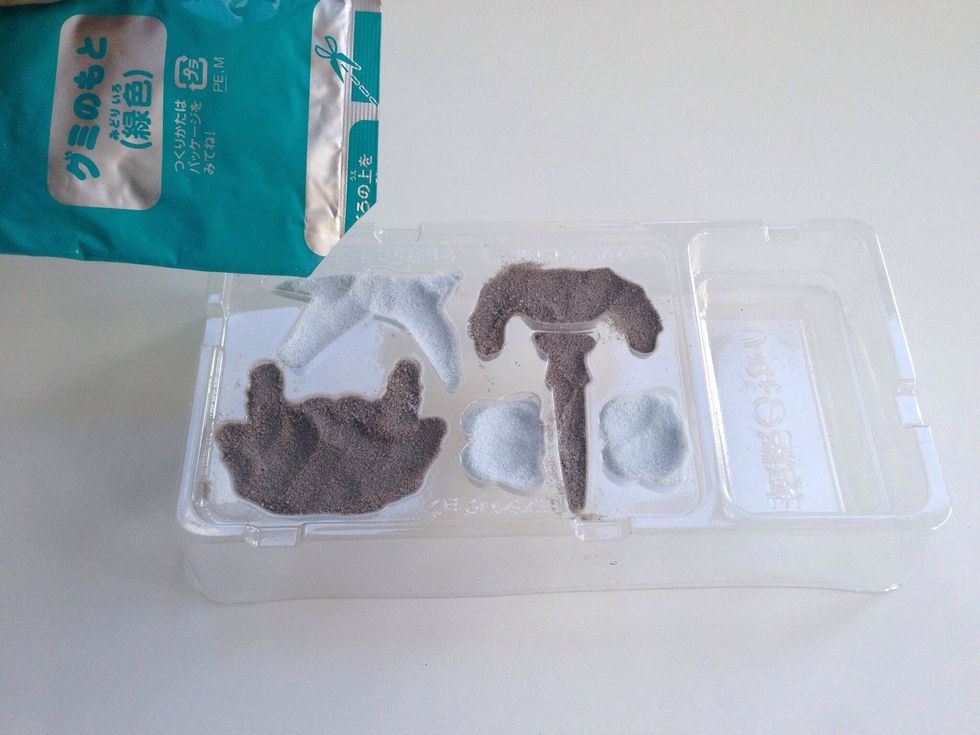 Do the same with the BLUE Melon a Powder packet until molds are filled-- you will probably have left over powder which if you have another mold you can make some different extra shapes