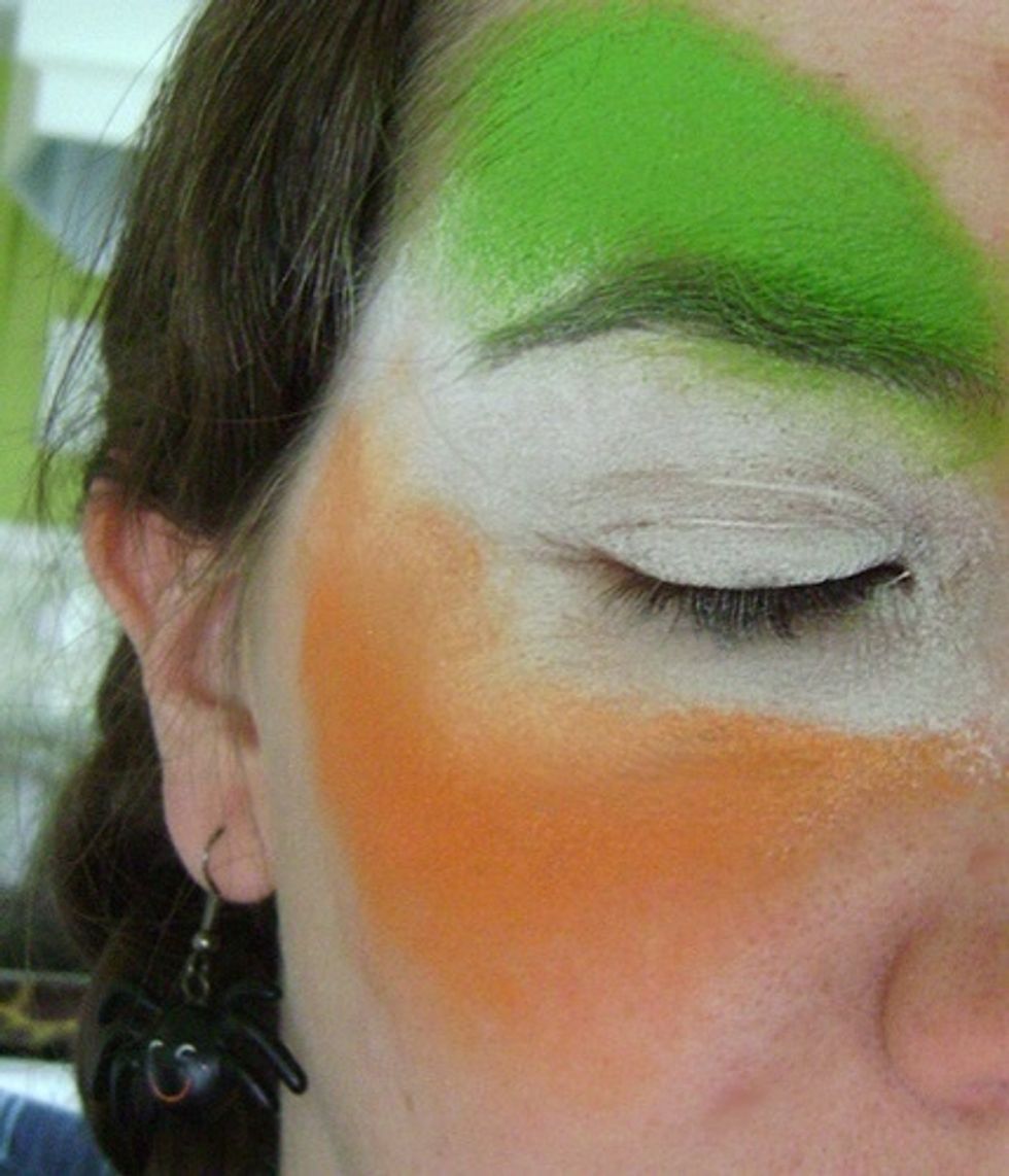 Do the same with the orange but allow it to go on your cheekbone as well.
