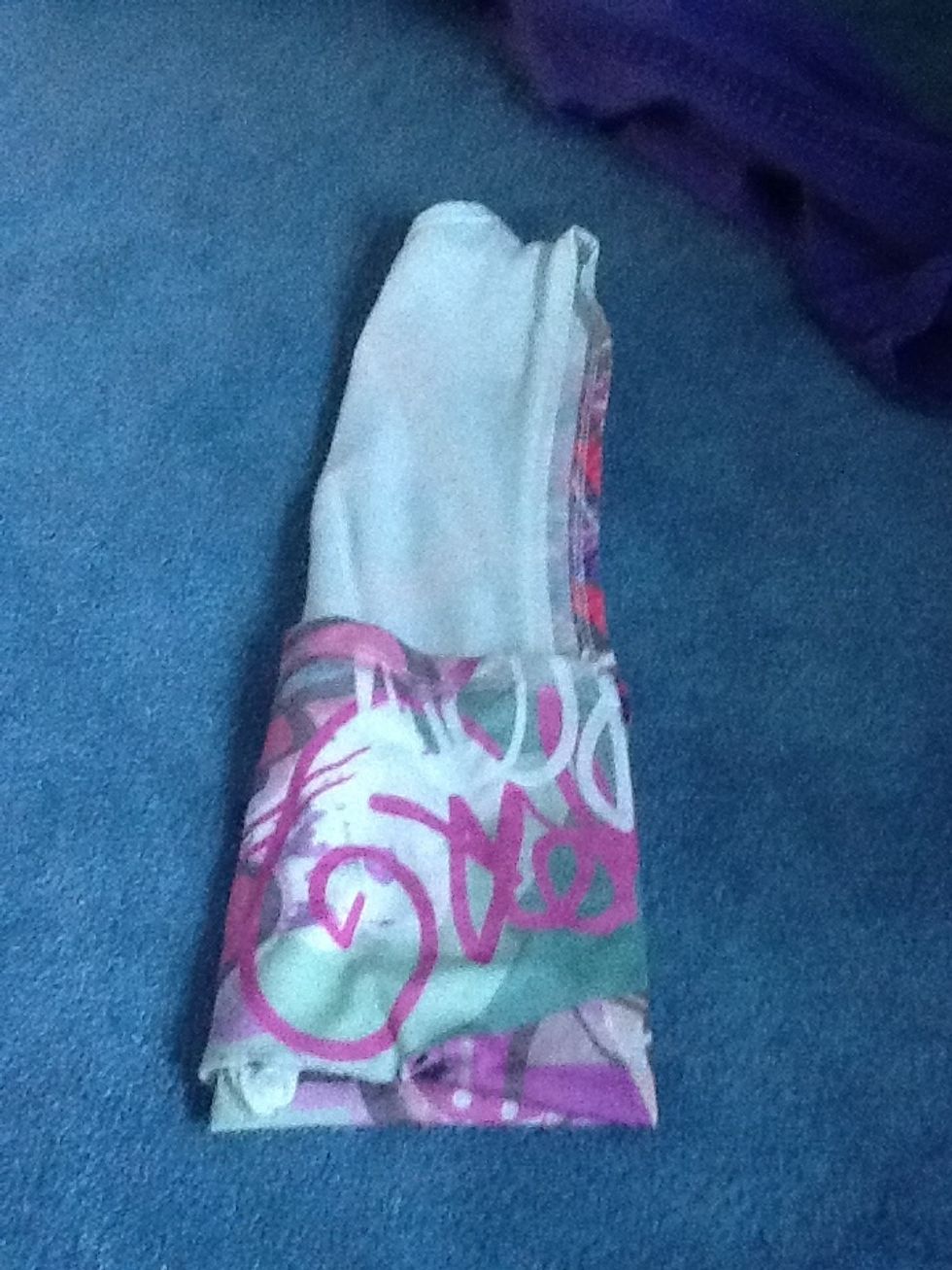 Do the same with the other side and fold it over the other side