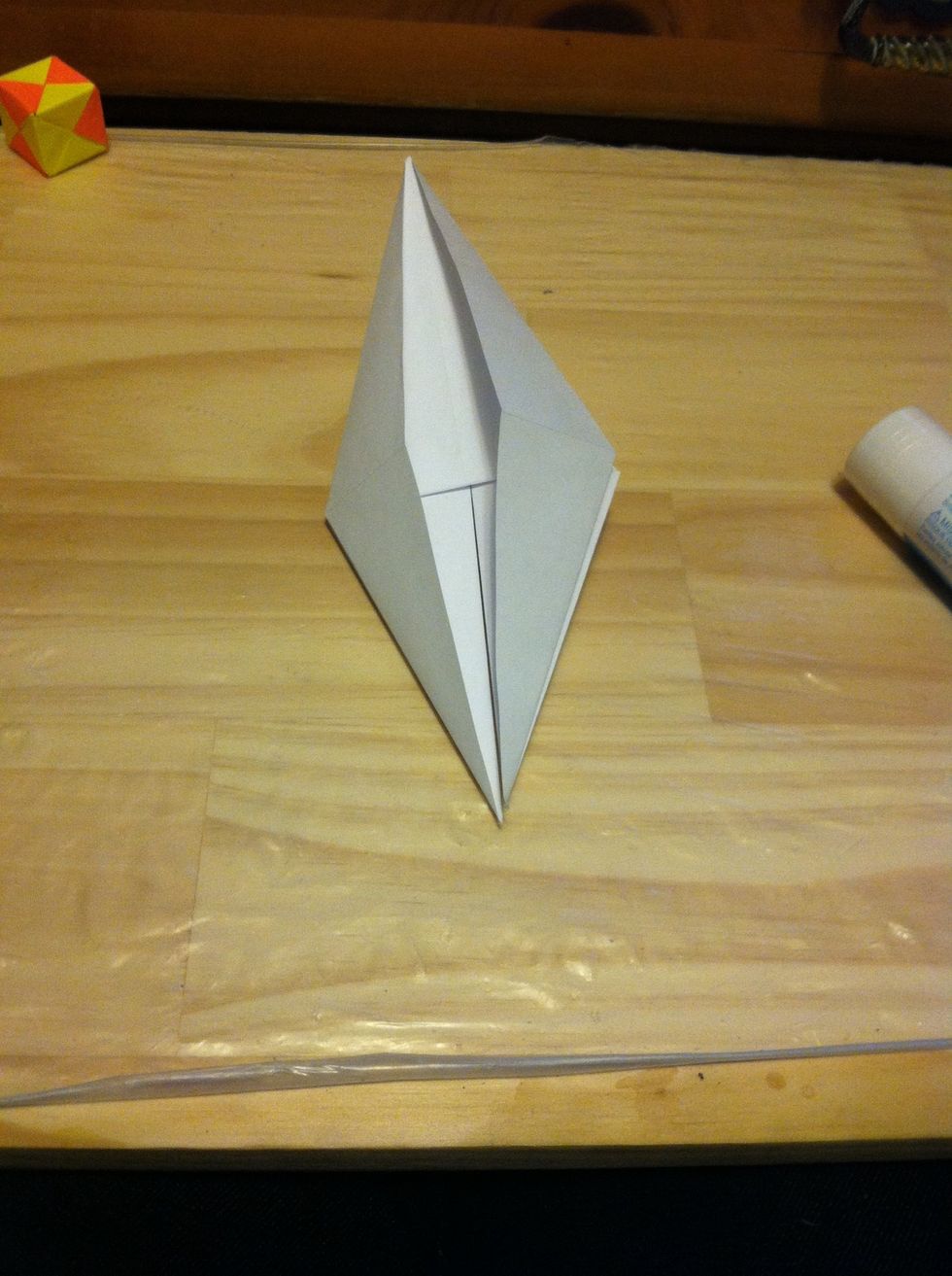 Do the same with the other side too. This is the model after you have done these folds.