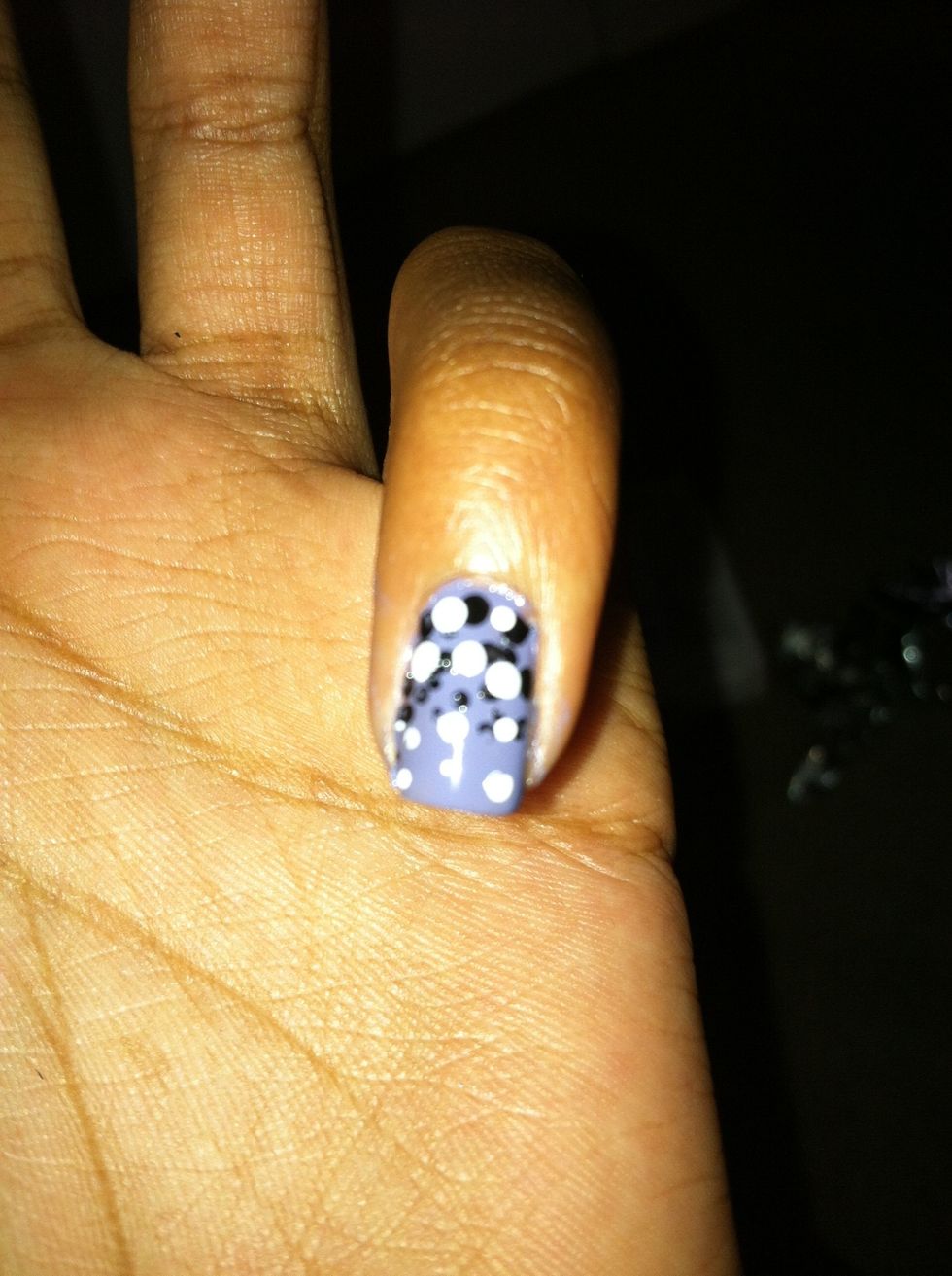 Do the same with the white,but make the dots closer to the tip of your nail