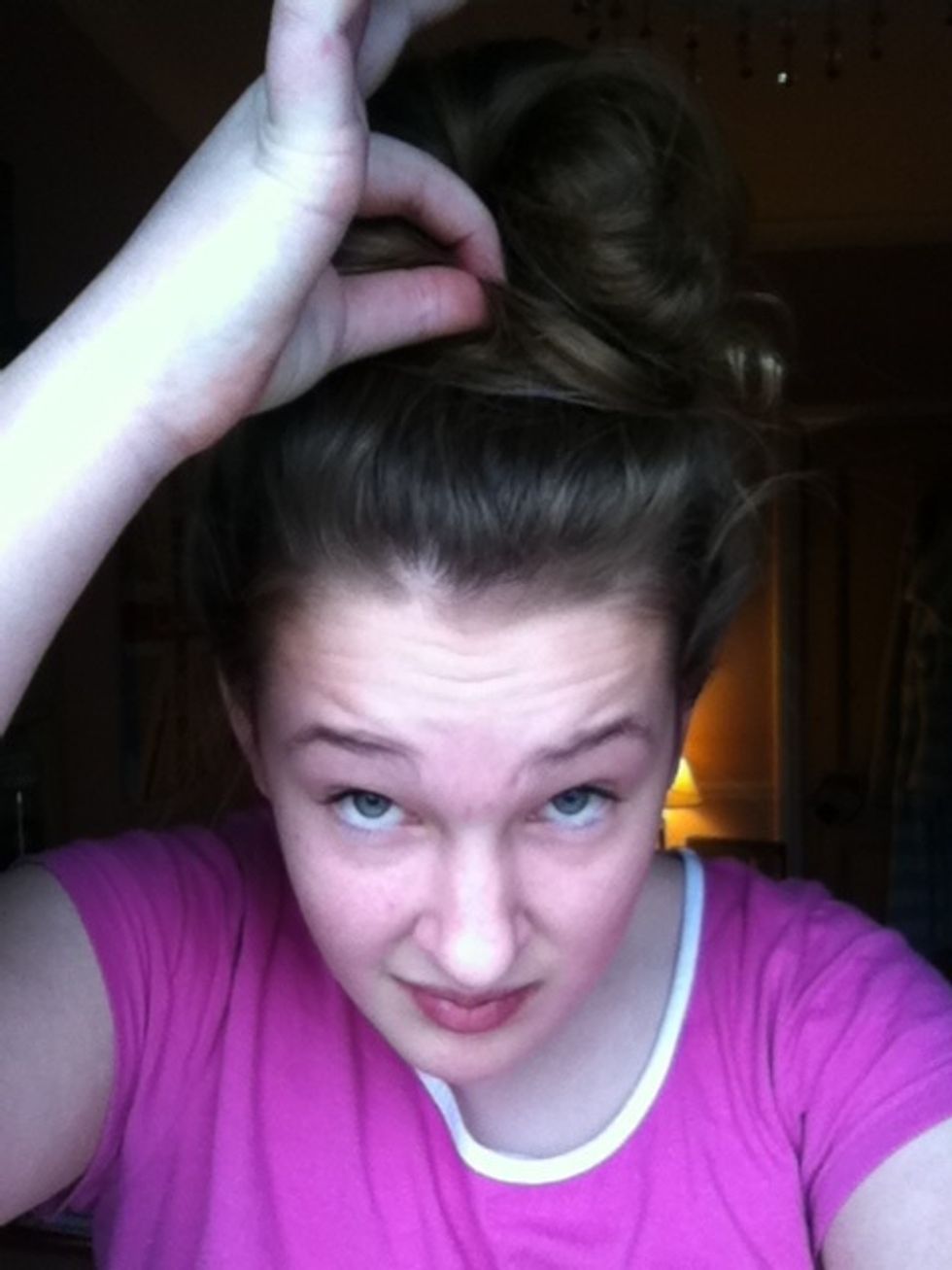 Do this again at the front and back of your bun