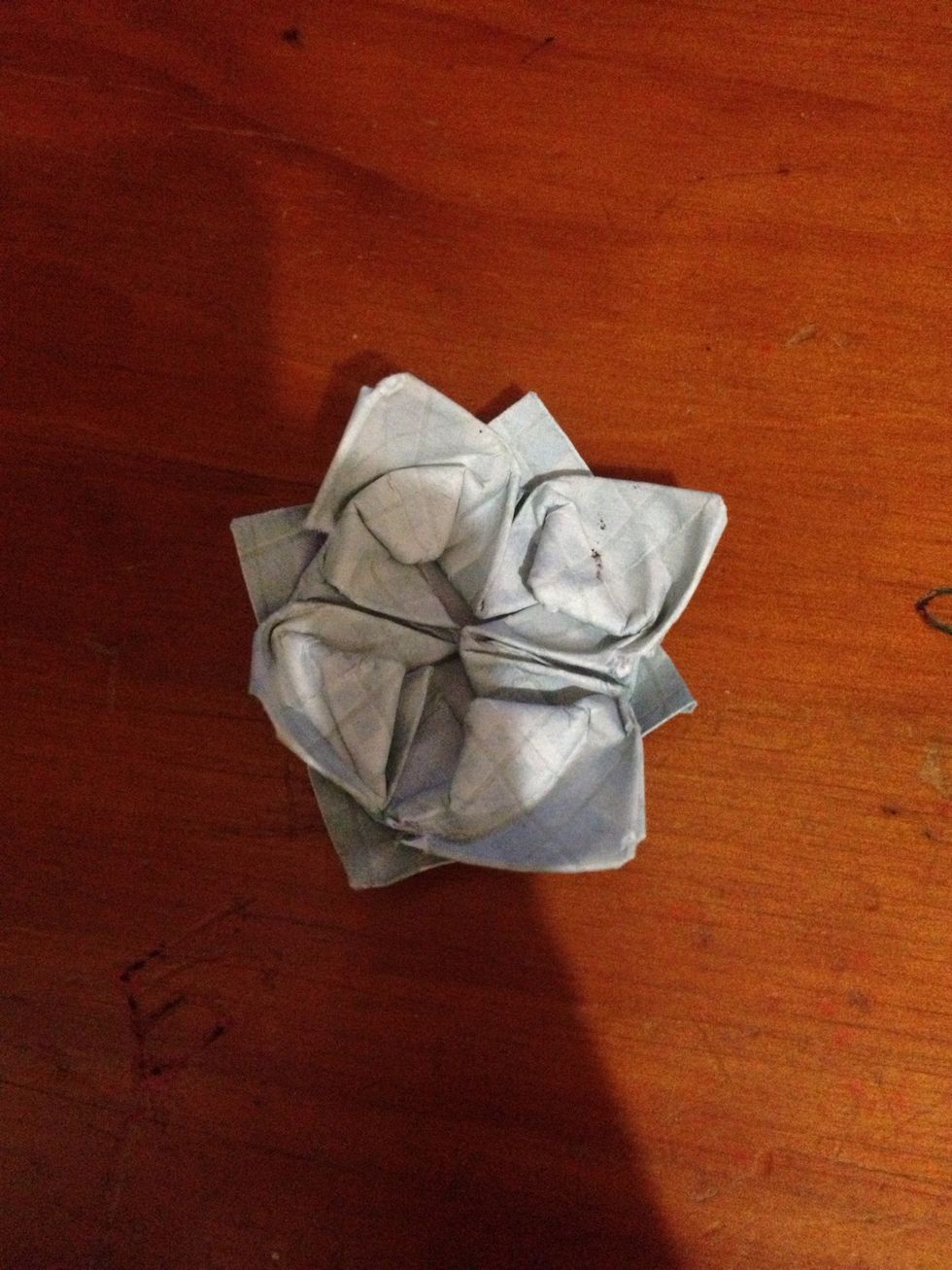 Do this again to make 4 more petals if the paper rips a little don't stress