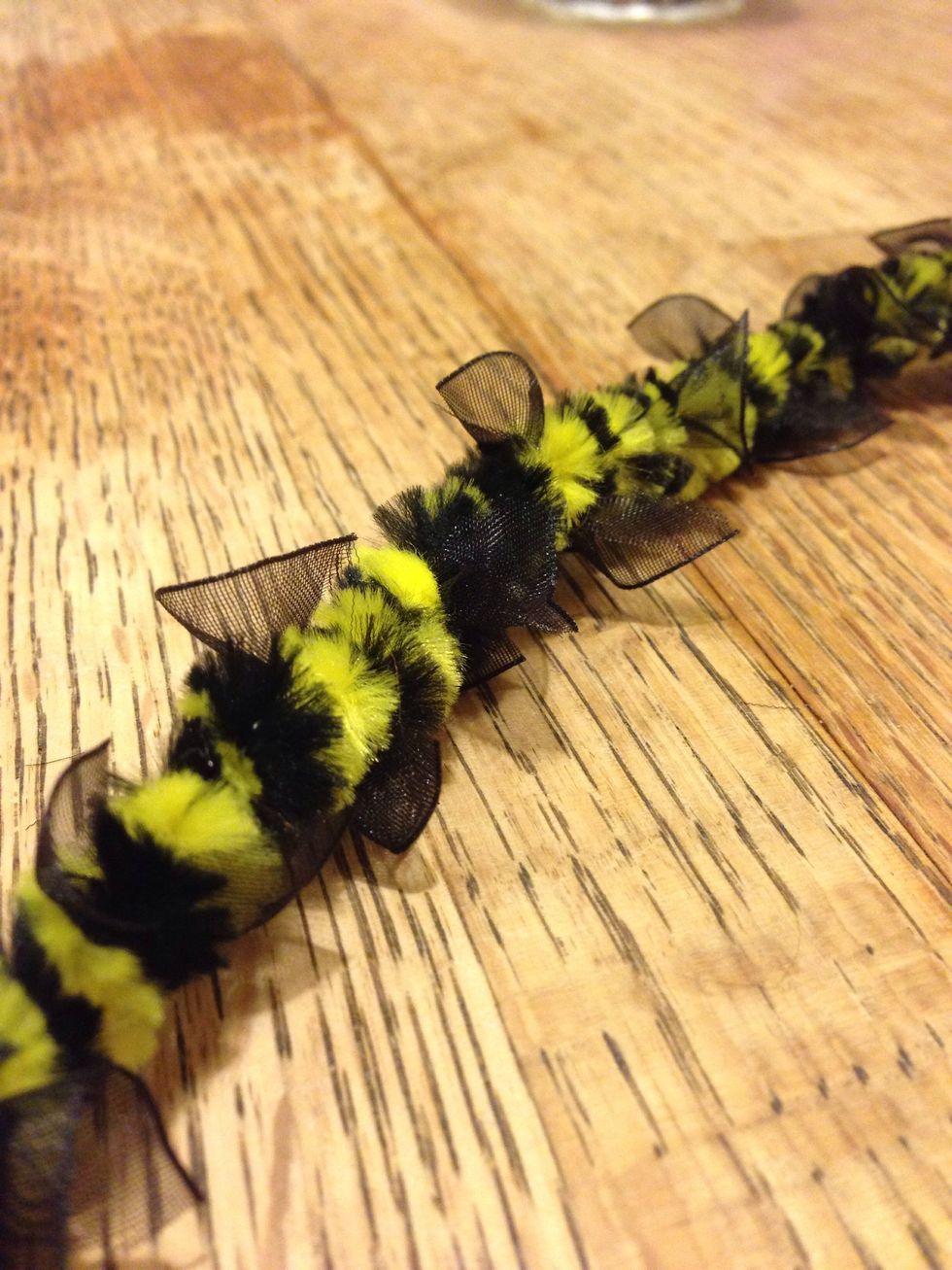 Do this down the length until you have a number of bees. I managed to fit 12 onto my pipe cleaners.