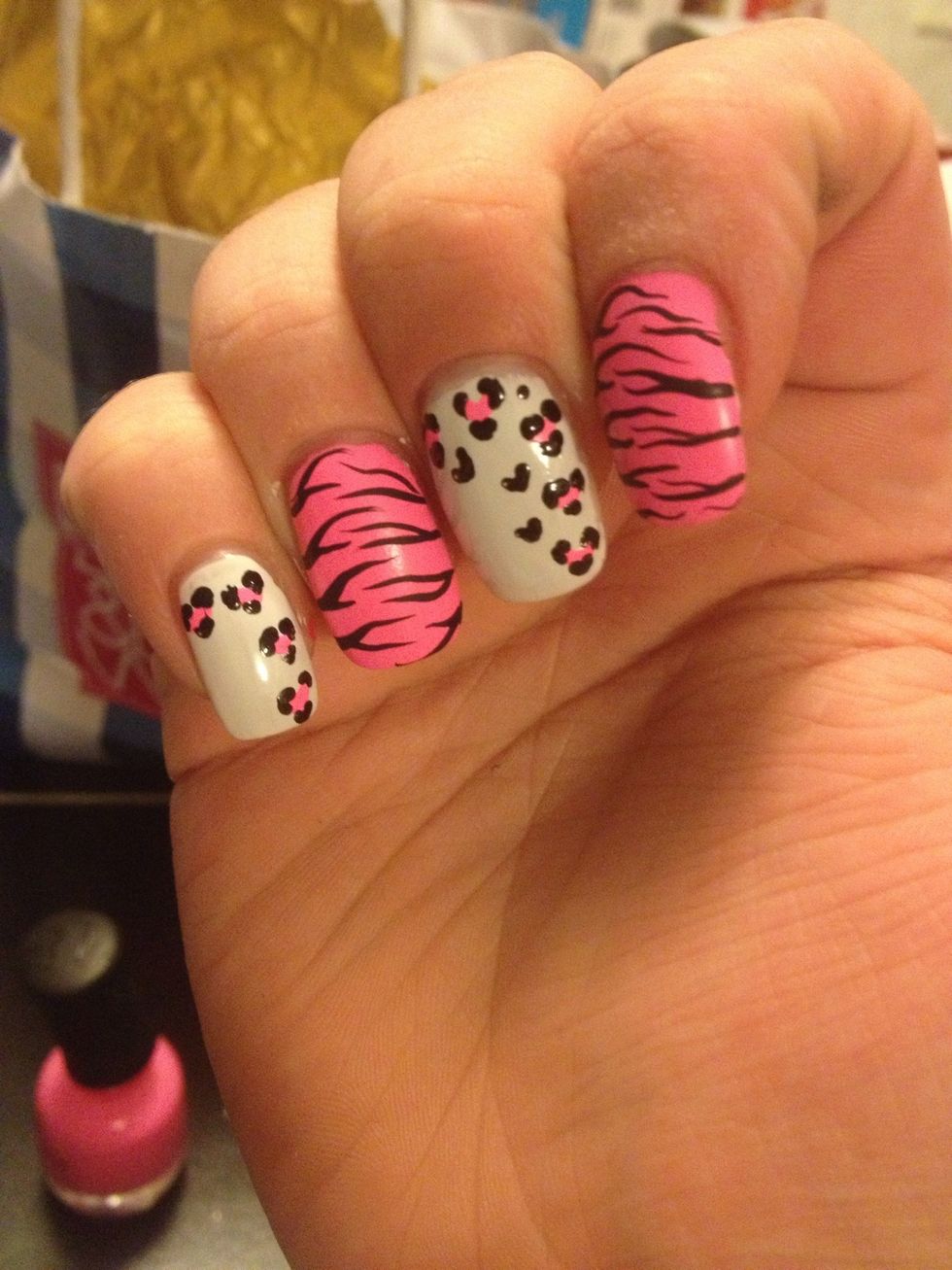 Do this to all your hearts, and if you have large spaces that need to be filled, add tiny black hearts using the same method as you did with creating the pink hearts.