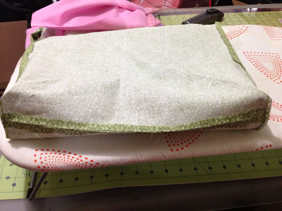 Do this to both sides of the bottom of the bag.