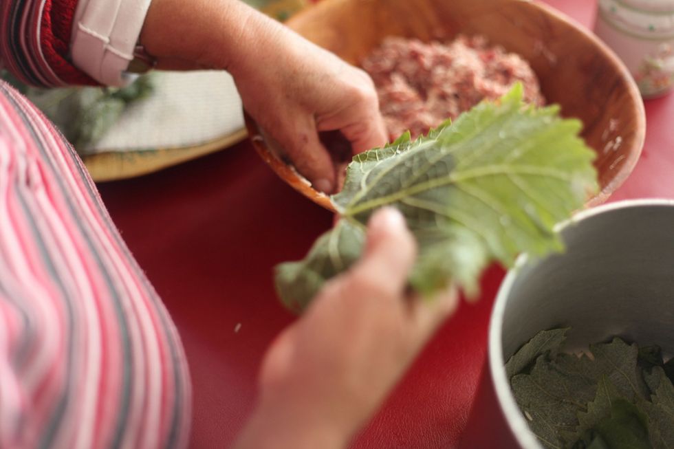 Do you have Vine leaves? If you don't it's ok to use more cabbage but this recipe will make 2 pots. One cabbage and one vine leaves. Do the same and fill the vine leaves with the same rice mix.