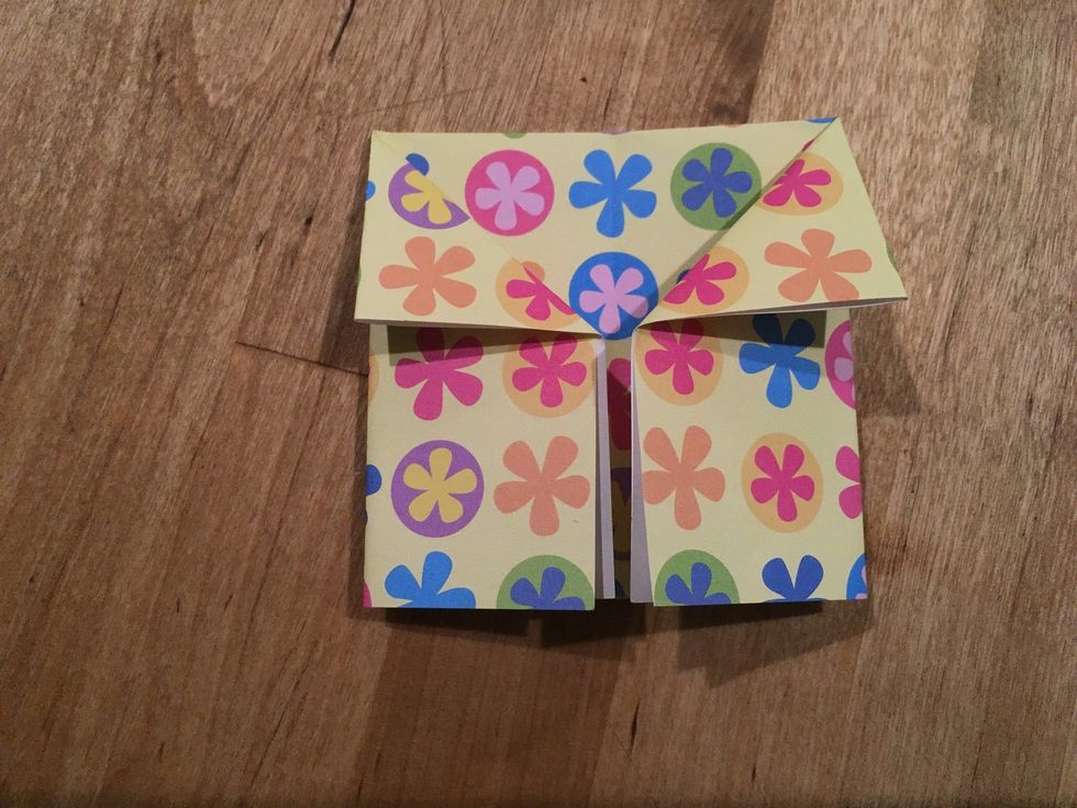 Dog ear the top corner closest to the center