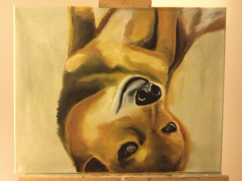 Dogs have pretty black lips, so take a little time with your pinky to add some detail and get the shape right. Continue to add white around the mouth to highlight.