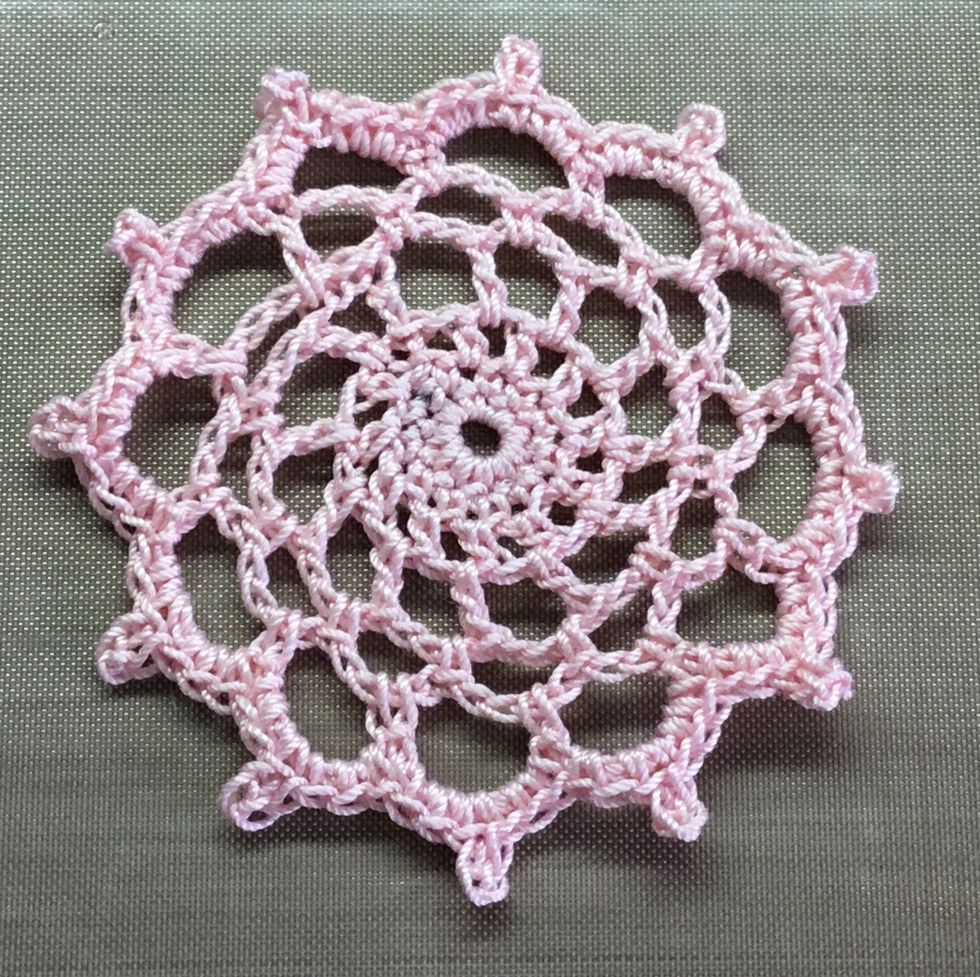 Doily finished with loose ends sewn in.