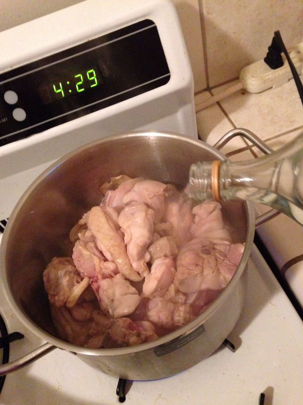 Don't be afraid at this step, pour the whole bottle of Michiu in the pot or as much as it cover chicken.