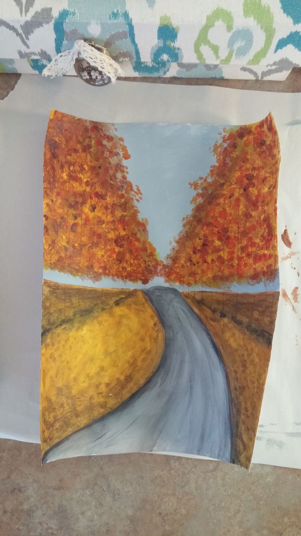 Don't be afraid to bring the leaves colors into the sky area and make the leaves stick out into the sky area. This keeps it looking like it really clumped together.