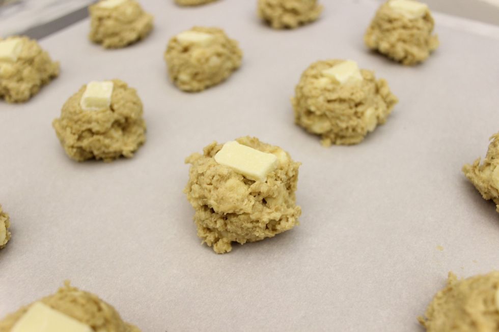 Don't flatten the cookie balls. Freeze for 10-15 minutes. Freezing keeps the cookies from flattening and spreading too much during baking.