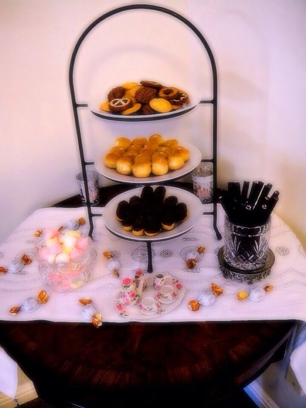 Don't forget the dessert table. I decided to place it on a separate table. The idea is to eat food before grabbing sweets