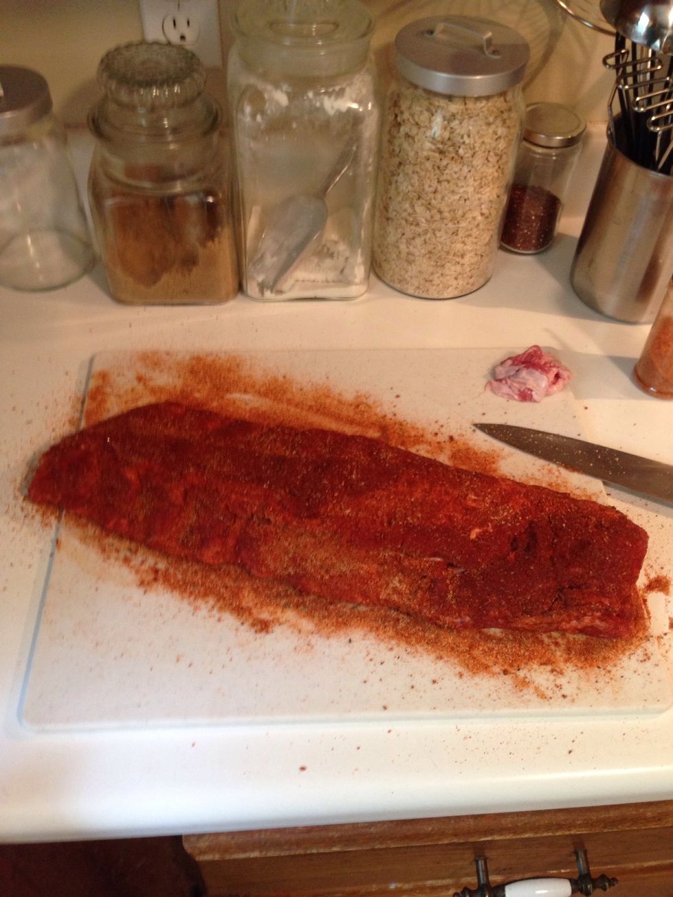 Don't forget the ends, underside, and edges. The WHOLE rack should be coated with dry rub. This will give us a beautiful crust later, which will help deliver a great flavor.