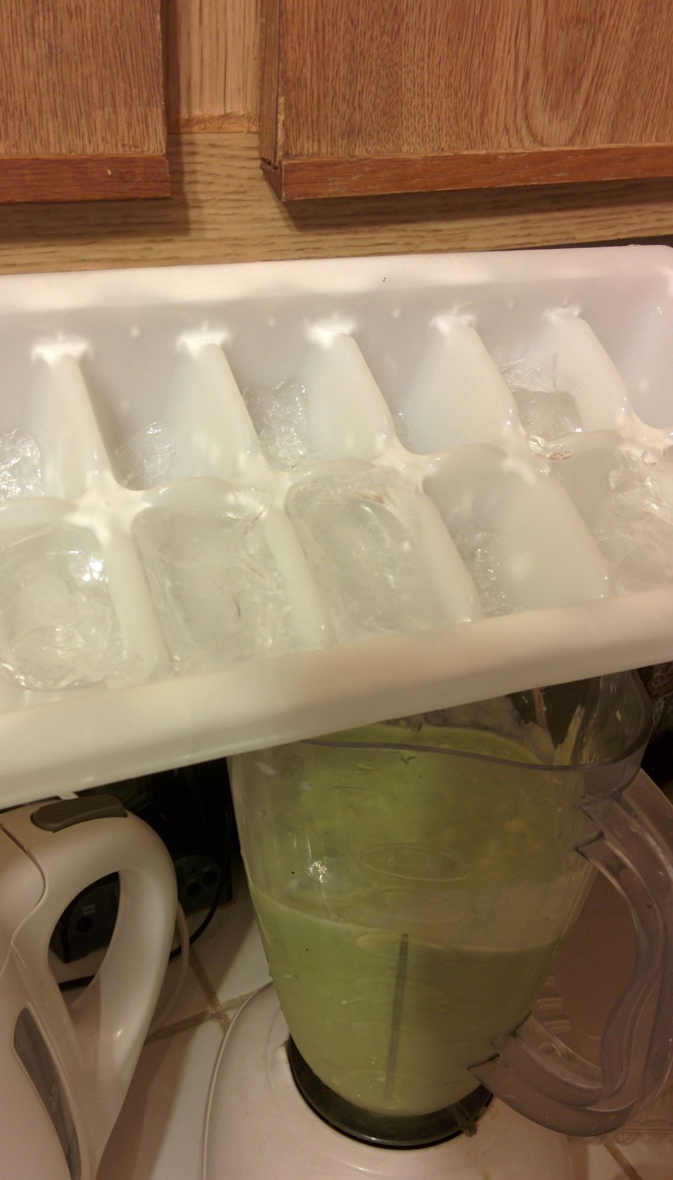 Don't forget to add some ice blocks (about 4 to 5 per glass) + milk to liquefy the avocado. Chocolate milk would be best but normal milk will do just fine because we have chocolate syrup!