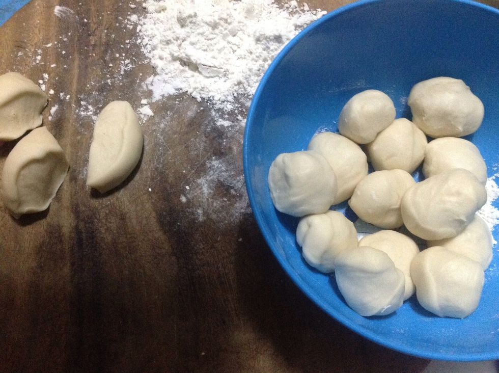 Don't forget to fill the bottom of the steamer with 1/3 of water, bring it to boil. Grease the layers of the steamer disks with some oil (to prevent the dumplings from sticking)