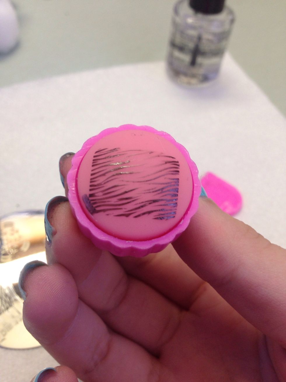 Don't hold it down for too long, but push hard. This should be what you see when you lift the stamper: a complete design.