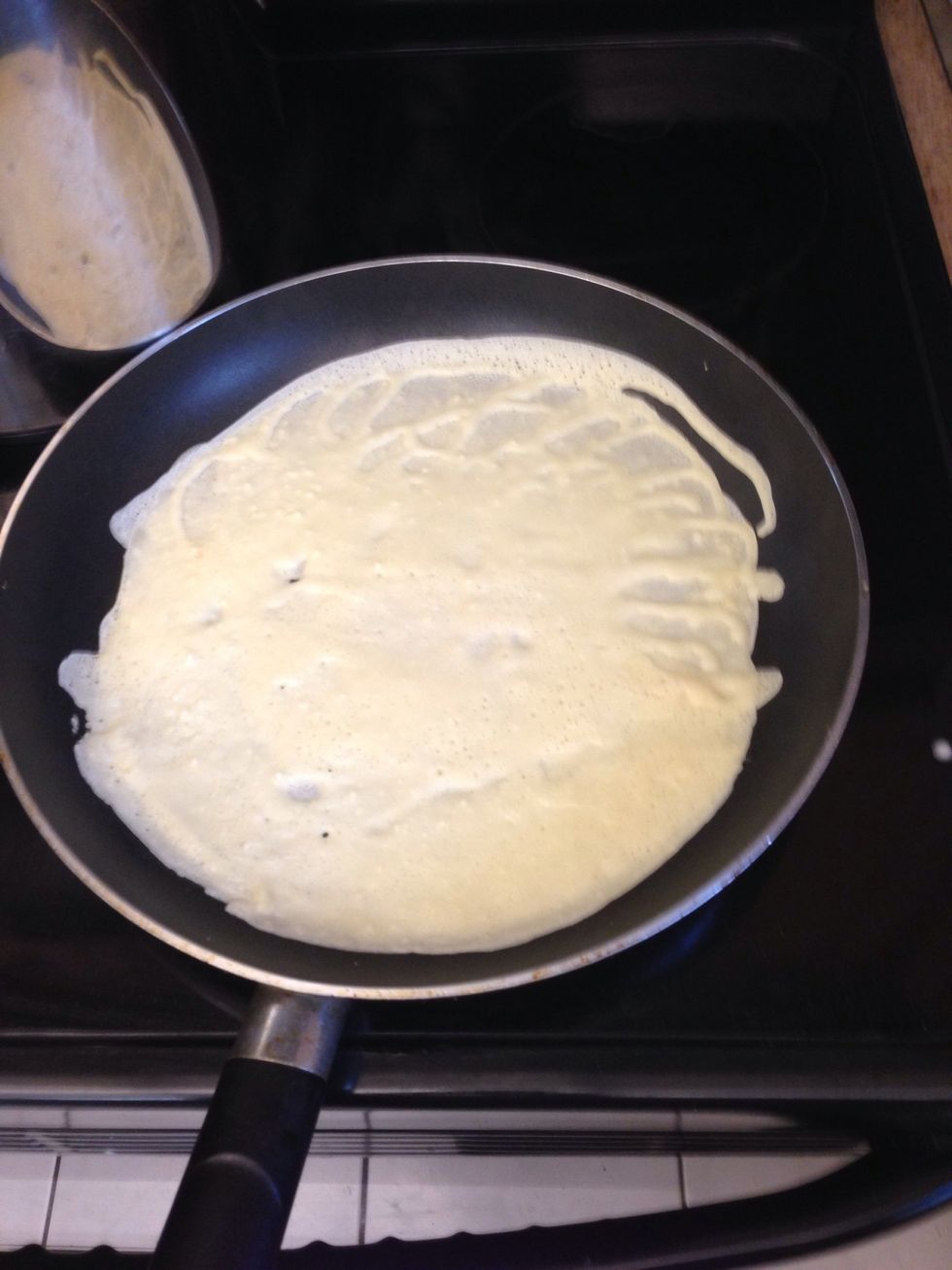 Don't pour to much batter, as you want these thin as possible. Roll the batter around the pan until there are no holes.