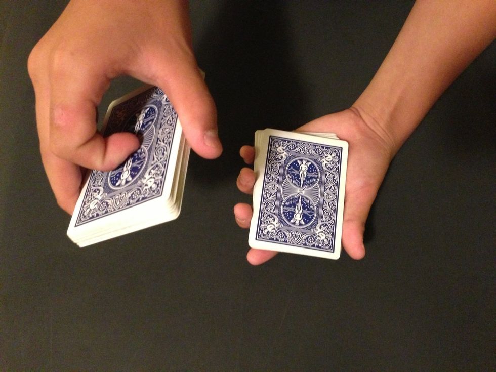 Don't put the top half on yet, keep your pinkie finger on top.