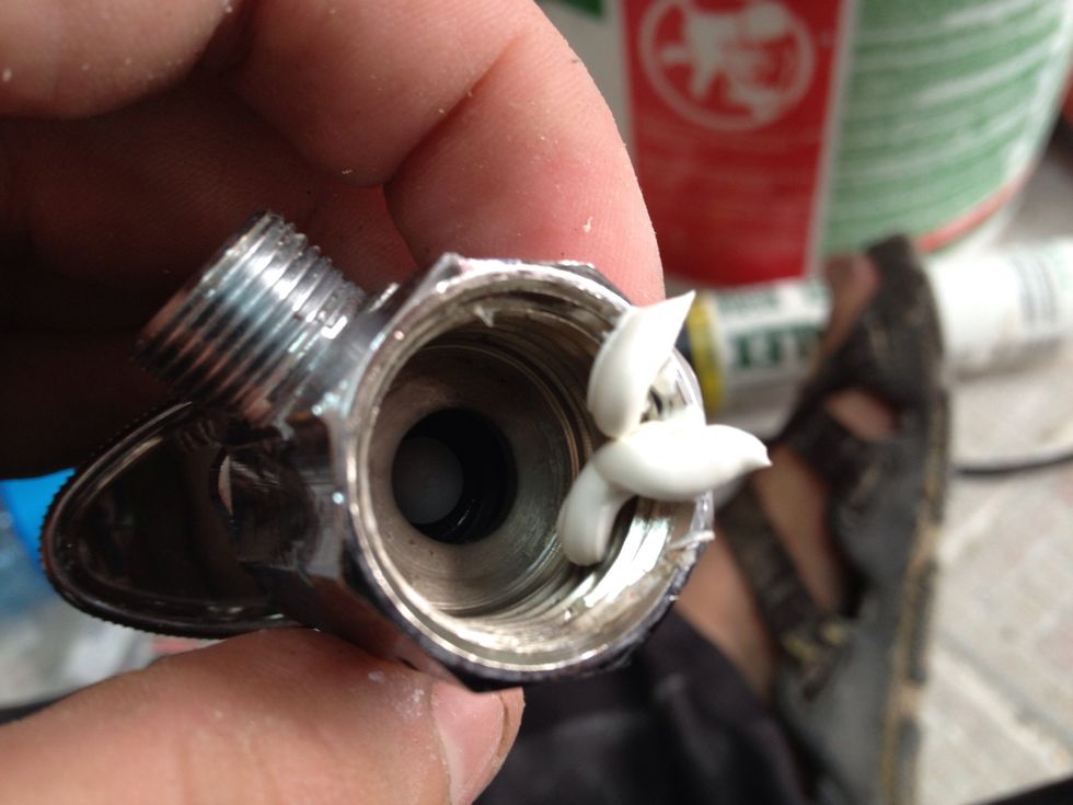 Don't put too much, you don't want to clog the hole on the valve. Just a lIttle will do, believe me.