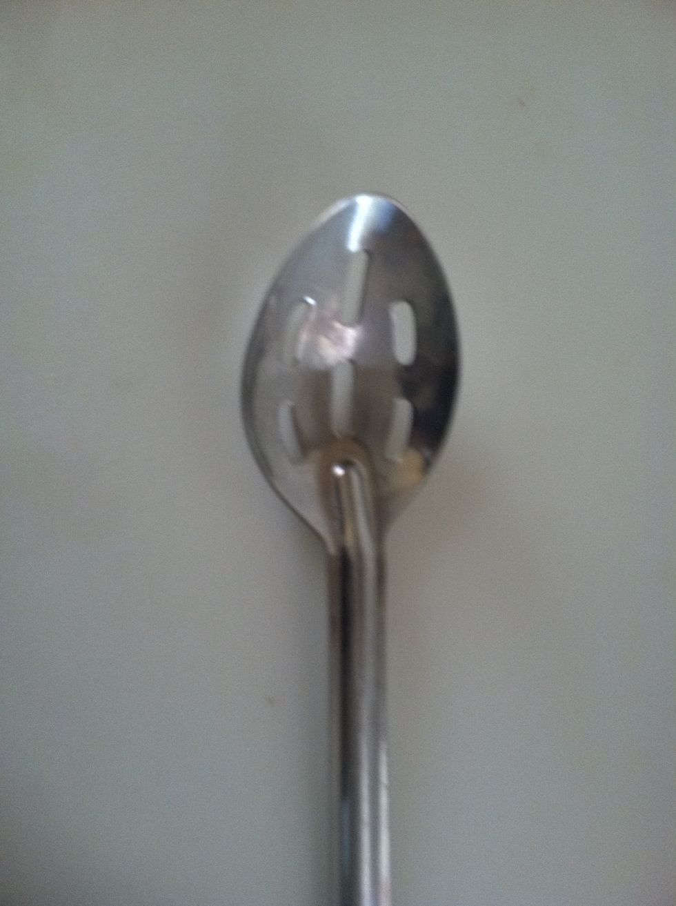 Don't remove the poached pear by the stem. Use a large slotted spoon and carefully remove from from saucepan.