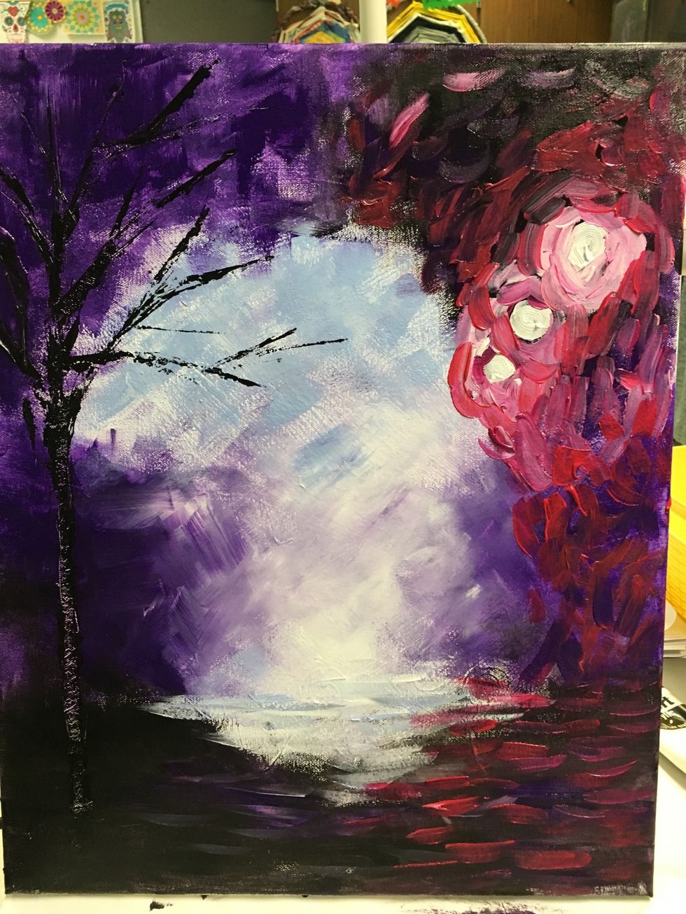 Don't rinse your brush as you add the pinks. Allow them to mix in and get the appearance of glowing. Add some horizontal pink strokes at the bottom to represent reflection.