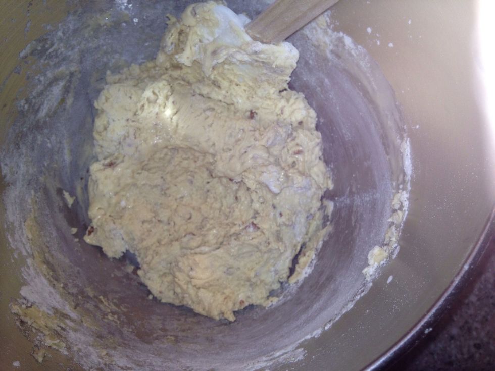 Don't stir too much, you don't want the gluten in the flour to start building and you want to keep the air you whisked in to the eggs.