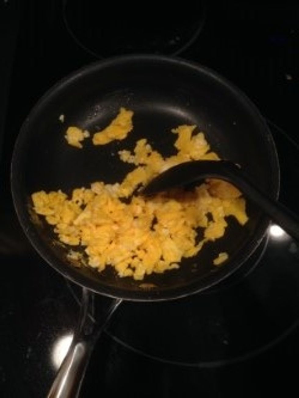 Don't stop mixing the eggs otherwise burn marks will appear on the eggs. The eggs are done when they are puffy and not runny.