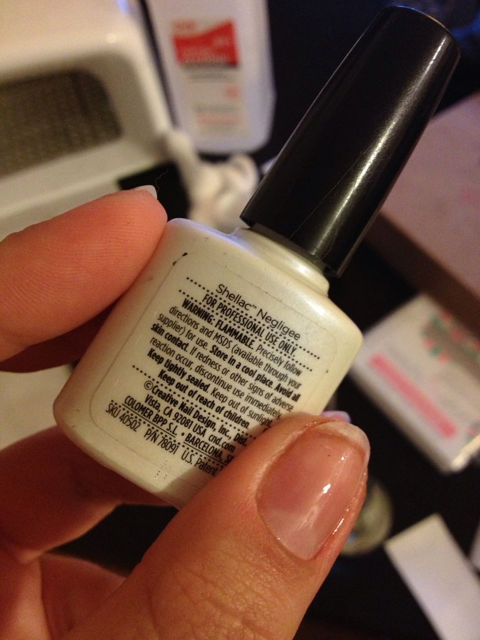 Don't touch the polish yet!! There is a sticky residue that is on the nails. It's for the other layers to harden. Second layer and first color is Negligee. It's a light pink with a nice shimmer.