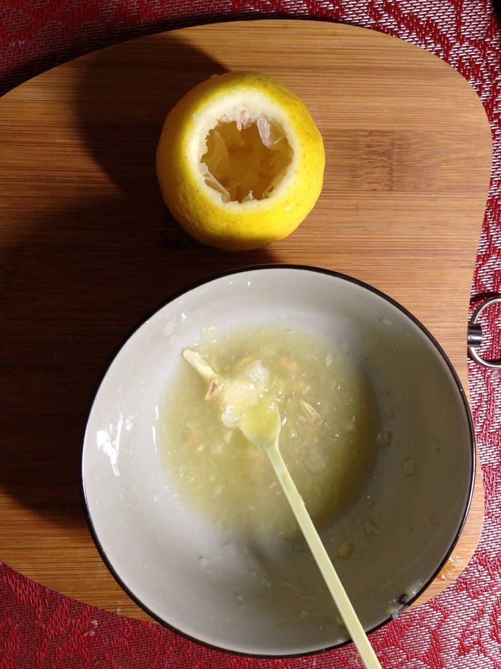 Don't WASTE lemon juice. Use it in cooking. Or alternatively, add some lemon juice to water in a spray bottle and spritz it around the room.