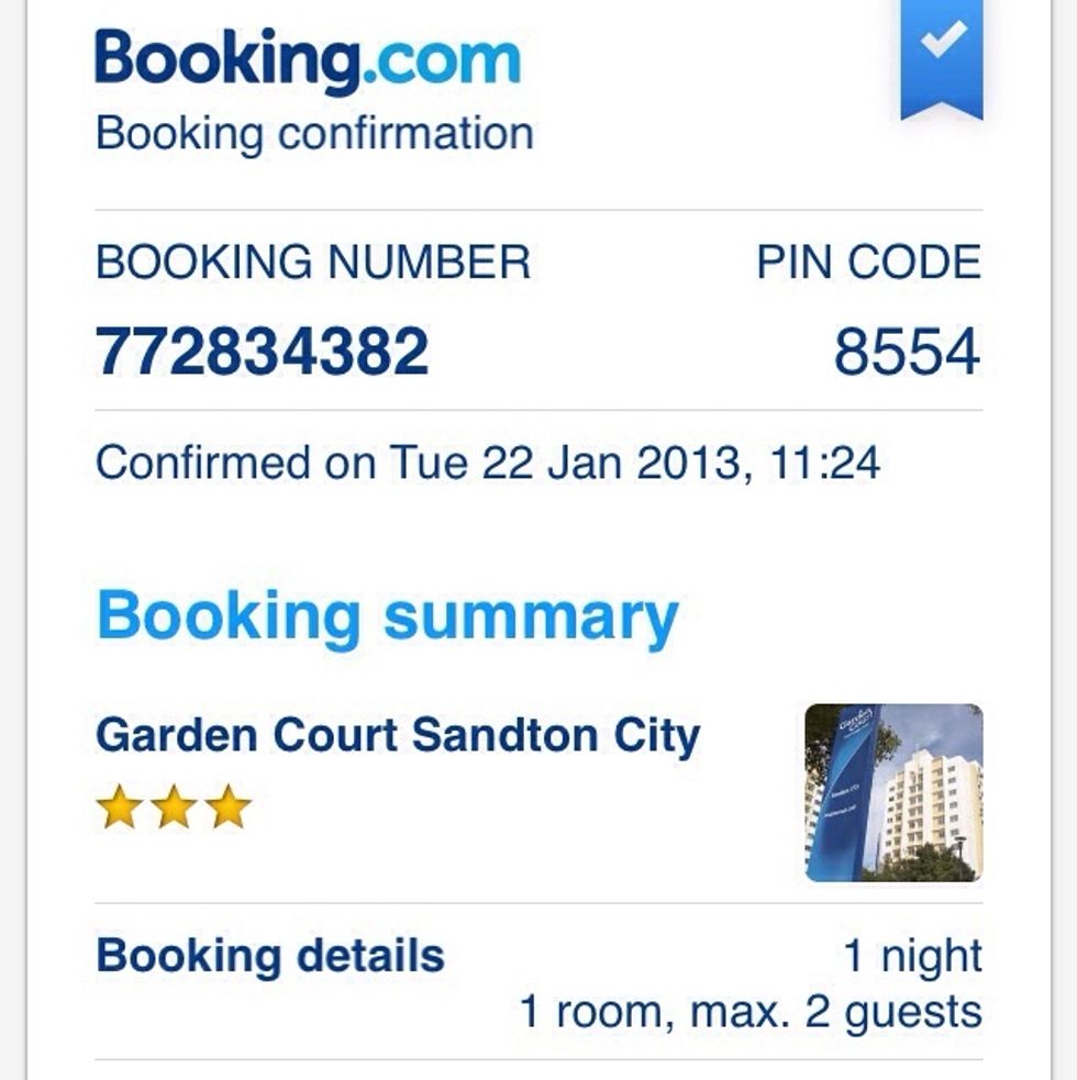 Don't waste time trying to contact your travel agency. Contact the hotel directly to tell them about the delay.