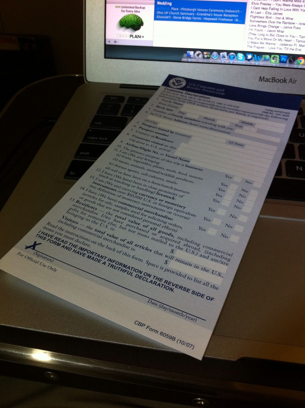 Don't worry about filling out the customs declaration during the flight. You'll take care of things on the kiosk later.