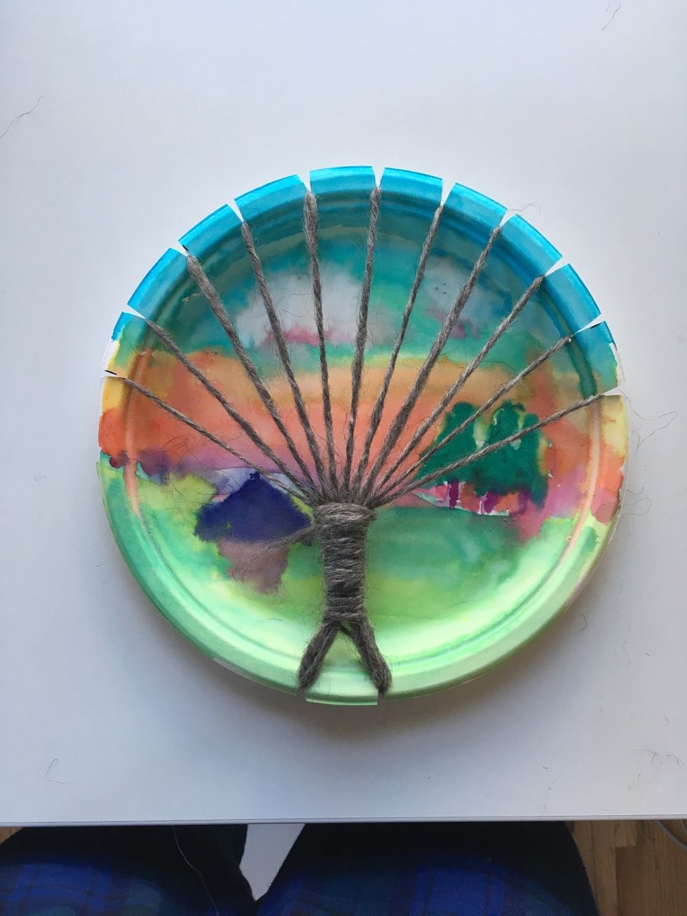 Done! Ask Mrs M. to hot glue your yarn at the end.