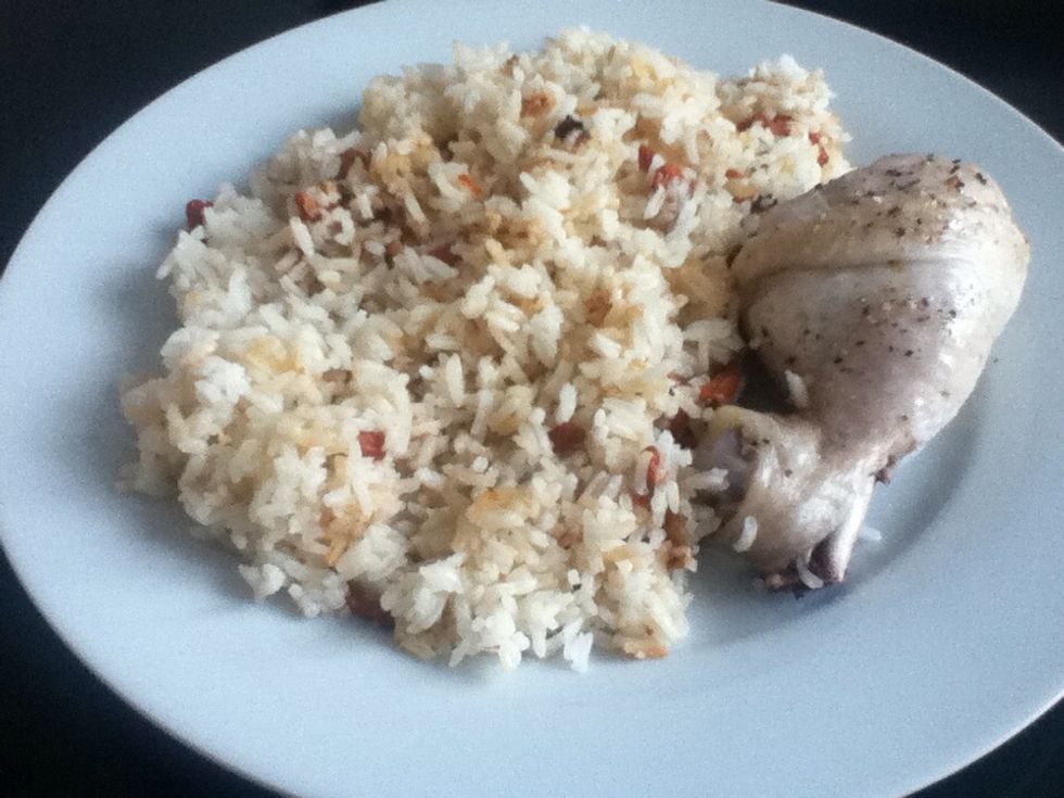 Done! Chicken will be cooked the same time with the rice. Add pepper. Enjoy!