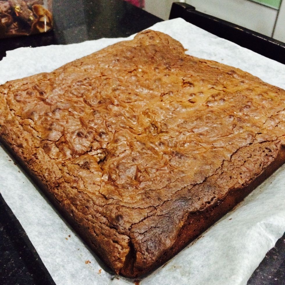 Done! Make sure to cool slightly before removing the brownie from the pan or else it will fall apart.