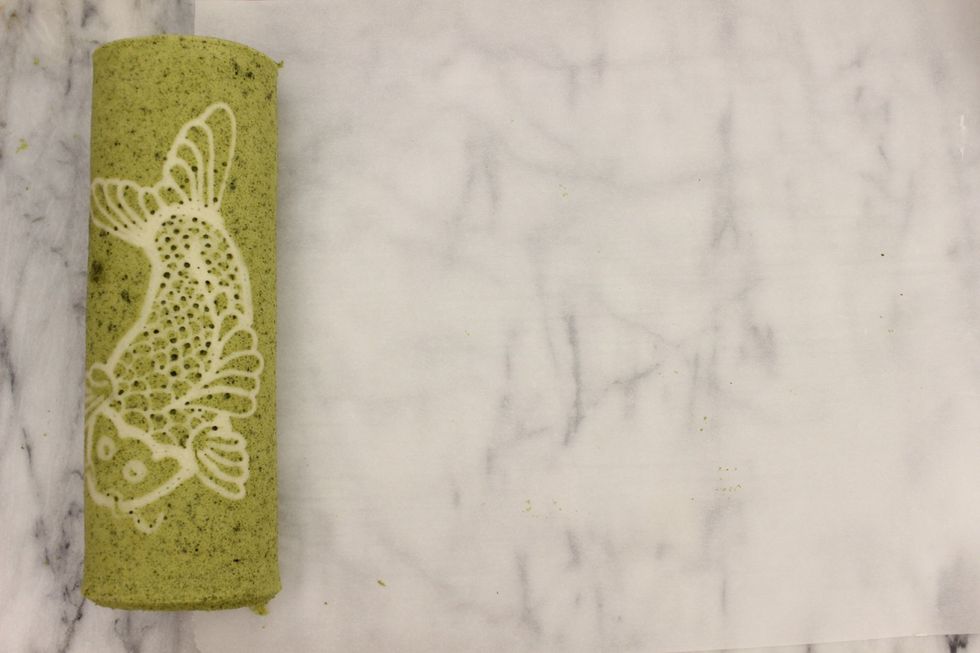 Done rolling! Ensure the seam is on the underside of the cake.