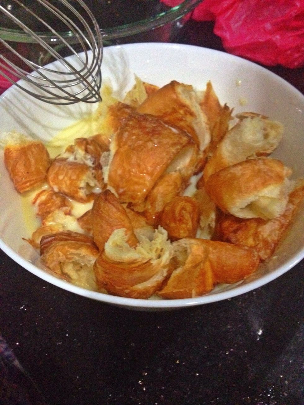 Done with that! Now add the croissants in this bowl. Submerge them and then put it in the fridge for 1 hr. Some let it soak for many hours but I think 1 is more than enough.